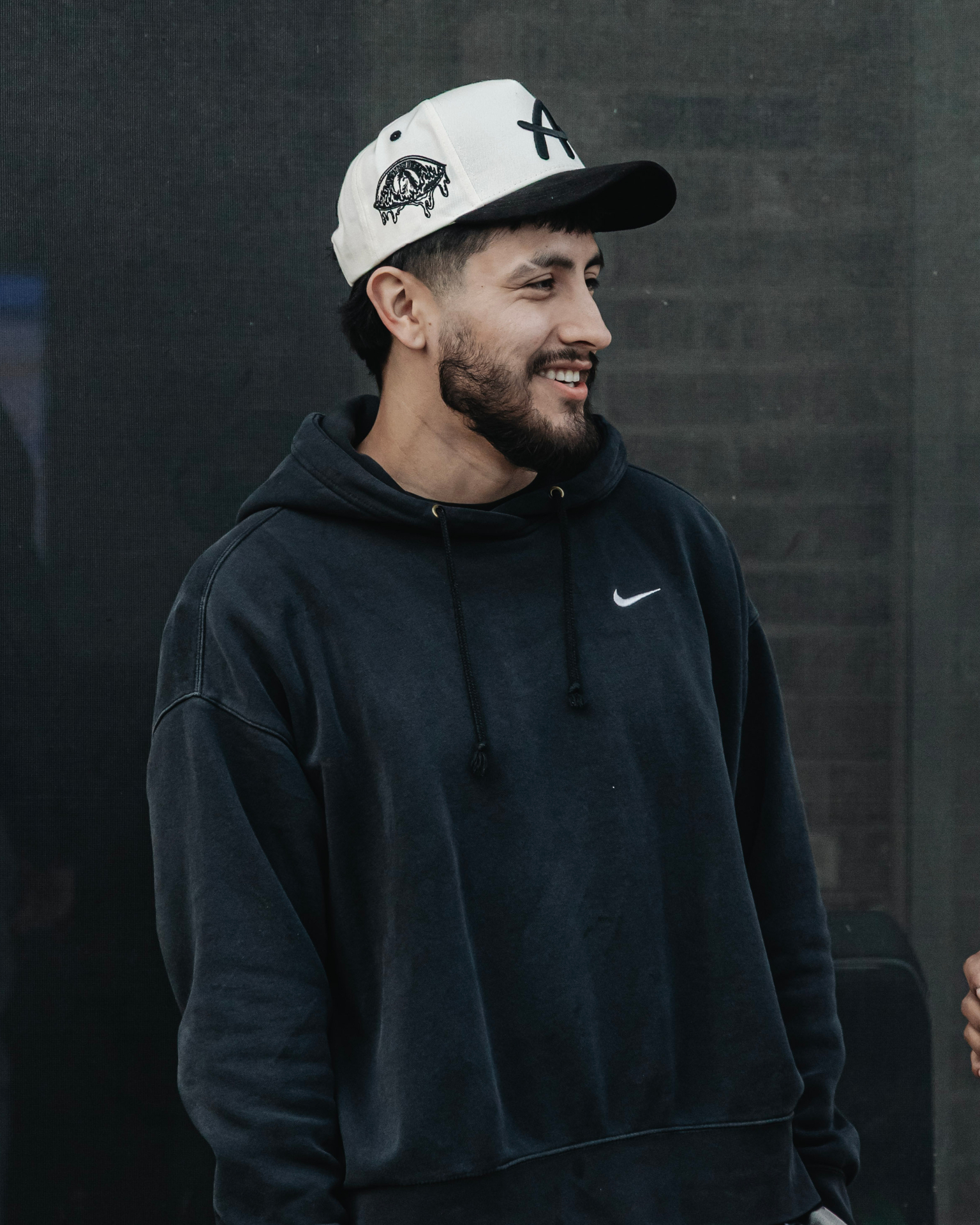 Adventus lifestyle — black hoodie + Eye cap